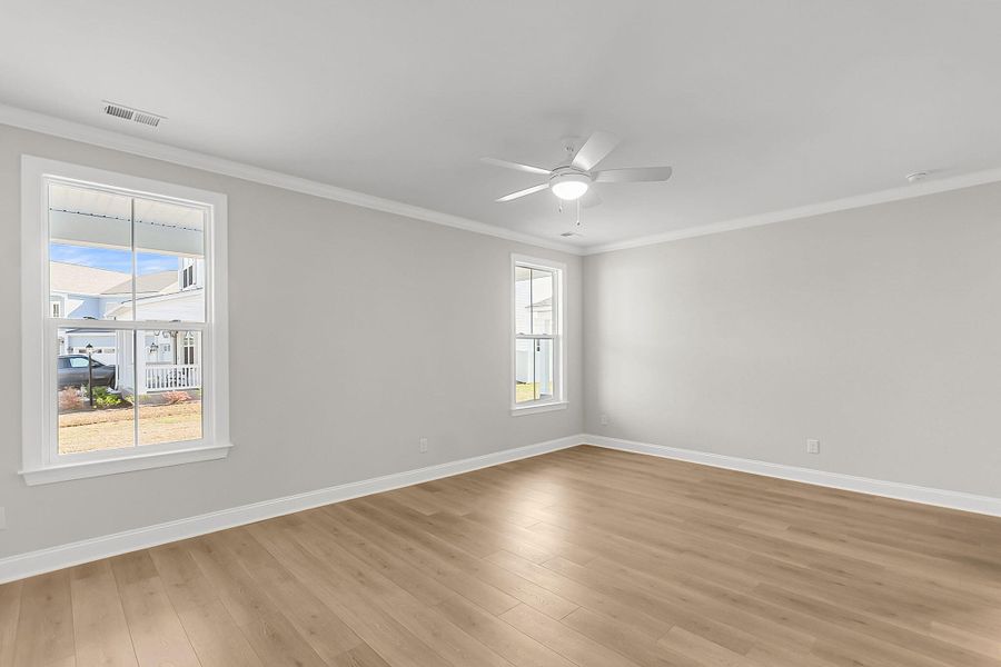 Spacious, unfurnished interior of a new home in Tidewater at Lakes of Cane Bay, Summerville (Image 22).