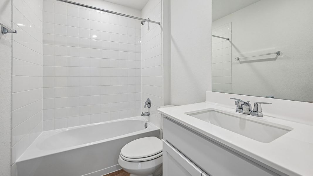 Furnished interior view inside a new home in Watermill, Uhland (Image 10).