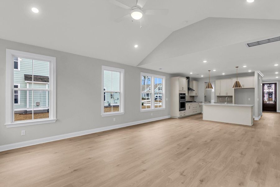 Spacious, unfurnished interior of a new home in Tidewater at Lakes of Cane Bay, Summerville (Image 38).