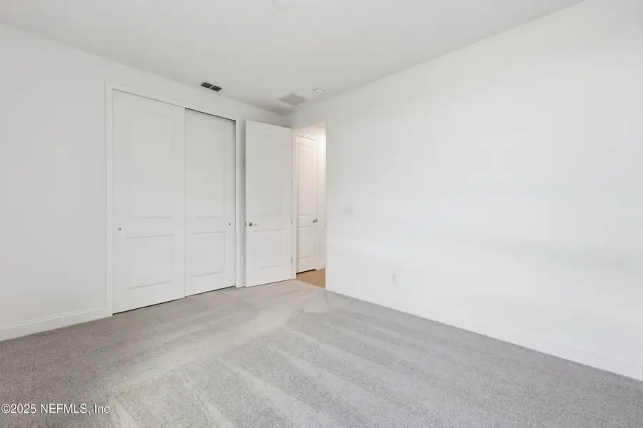 Spacious, unfurnished interior of a new home in Edenbrooke at Hyland Trail | 55+: Edenbrooke at Hyland Trail 60s, Green Cove Springs (Image 20). Spacious, unfurnished interior of a new home in Edenbrooke at Hyland Trail | 55+: Edenbrooke at Hyland Trail 60s, Green Cove Springs (Image 20).