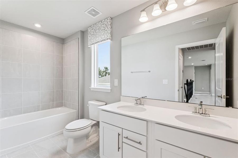 Furnished interior view inside a new home in Bella Terra, Clermont (Image 10). Furnished interior view inside a new home in Bella Terra, Clermont (Image 10).