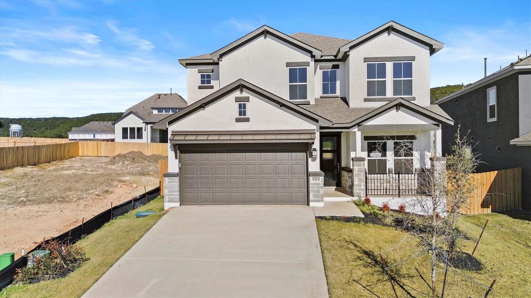 View of front of house with a garage