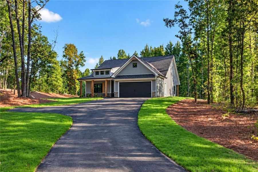 Front exterior of a new home in , Silver Creek, GA, highlighting curb appeal (Image 27). Front exterior of a new home in , Silver Creek, GA, highlighting curb appeal (Image 27).