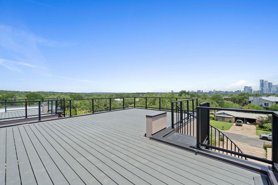 City skyline views from a generously sized rooftop deck. City skyline views from a generously sized rooftop deck.