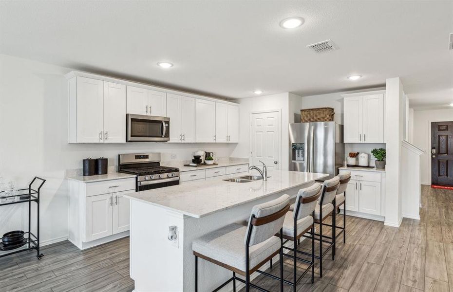 Roomy kitchen designed for functionality and comfort, with plenty of workspace *Model representation