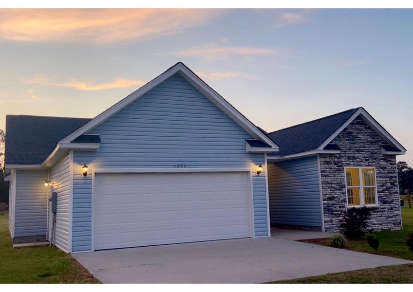 Front exterior of a new home in , St. Stephen, SC, highlighting curb appeal (Image 2).