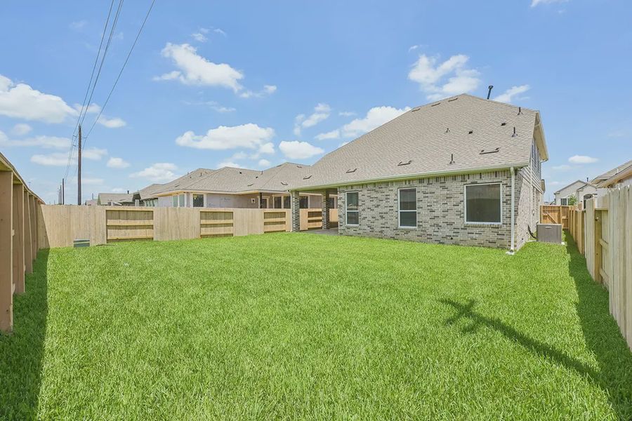 Exterior details and patio area of a home in Wood Leaf Reserve, Tomball (Image 26). Exterior details and patio area of a home in Wood Leaf Reserve, Tomball (Image 26).