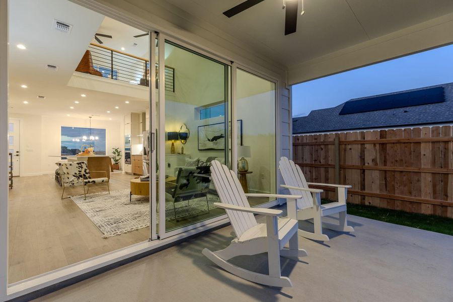 View of patio with a ceiling fan