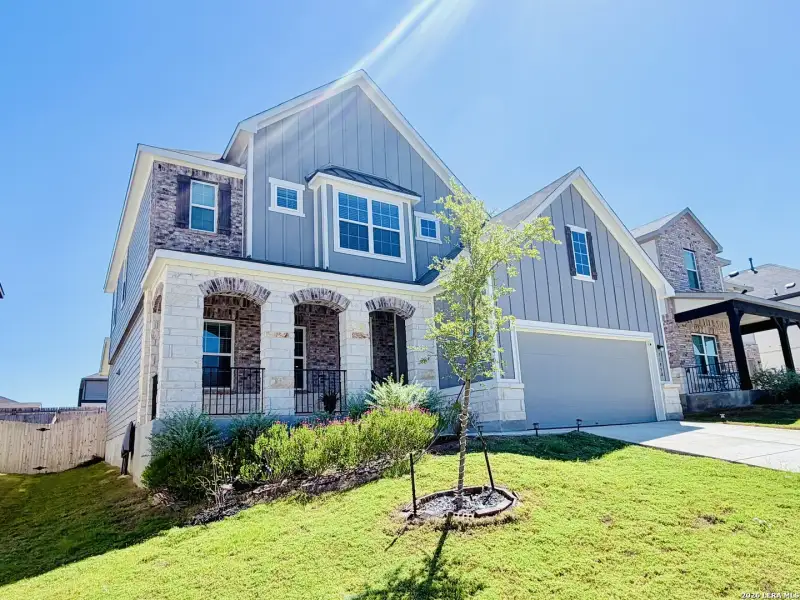 Front exterior of a new home in , Live Oak, TX, highlighting curb appeal (Image 27).