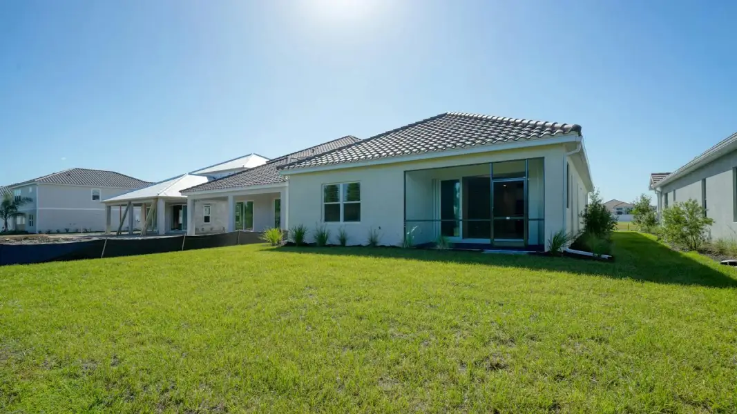 Exterior details and patio area of a home in Windward Real Estate and Homes for Sale in Sarasota, FL - Neal Communities, Sarasota (Image 26). Exterior details and patio area of a home in Windward Real Estate and Homes for Sale in Sarasota, FL - Neal Communities, Sarasota (Image 26).