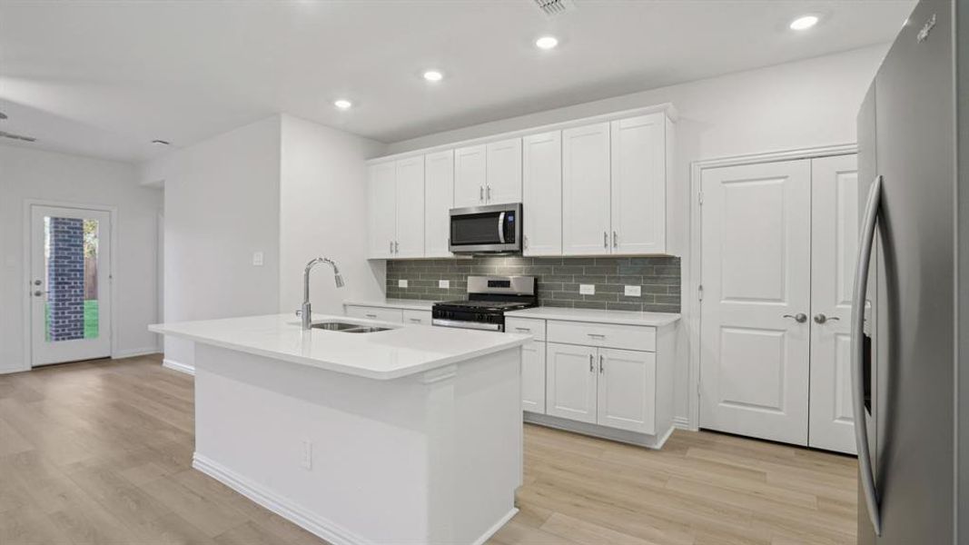 Furnished interior view inside a new home in Eastridge - Spring Series, McKinney (Image 8). Furnished interior view inside a new home in Eastridge - Spring Series, McKinney (Image 8).