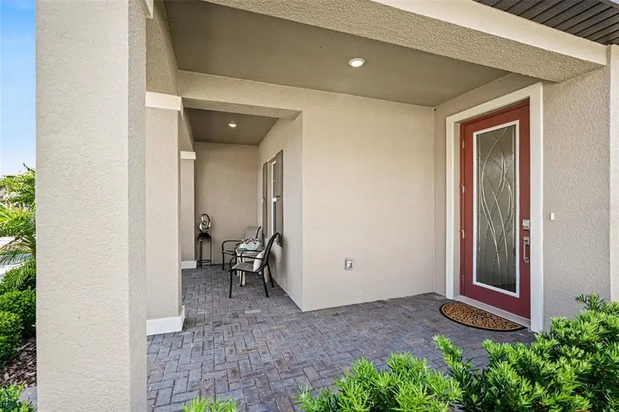 Exterior details and patio area of a home in Angeline Active Adult, Land O' Lakes (Image 4).