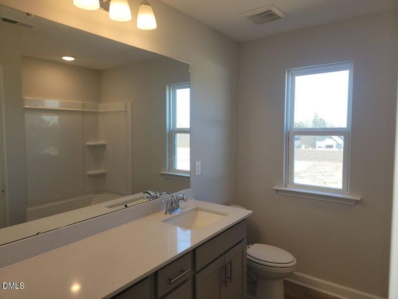 Furnished interior view inside a new home in Tobacco Road, Angier (Image 6).