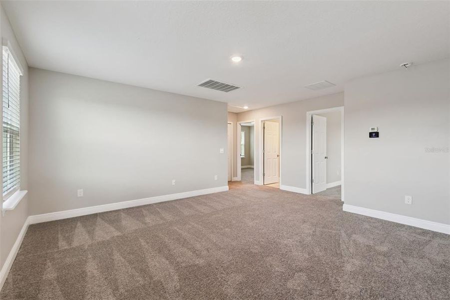 Spacious, unfurnished interior of a new home in , Daytona Beach (Image 37).