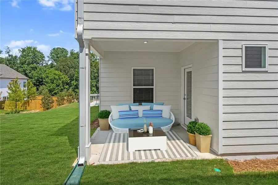 Exterior details and patio area of a home in The Andros, Dalton (Image 3).