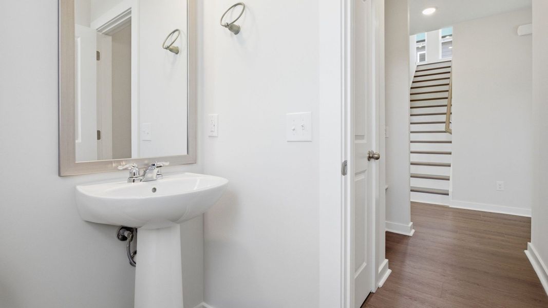 Powder room with nearby stairs Powder room with nearby stairs
