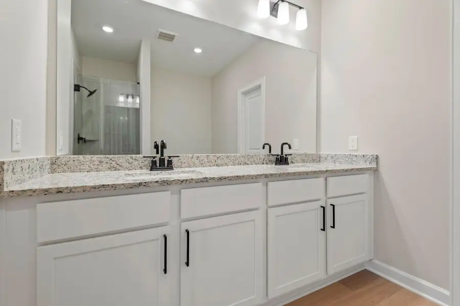 Furnished interior view inside a new home in Magnolia Woods, Magnolia (Image 5). Furnished interior view inside a new home in Magnolia Woods, Magnolia (Image 5).