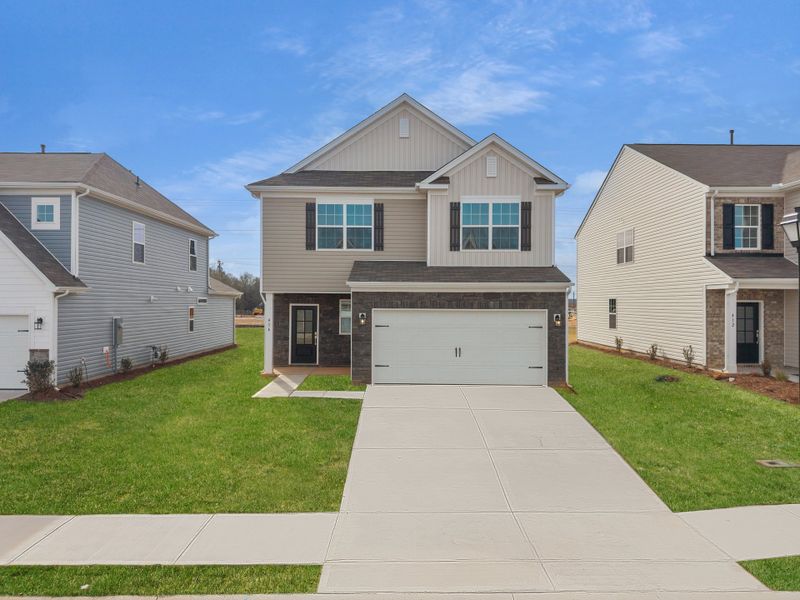 Front exterior of a new home in Neely Park: Walk, Woodruff, SC, highlighting curb appeal (Image 1).