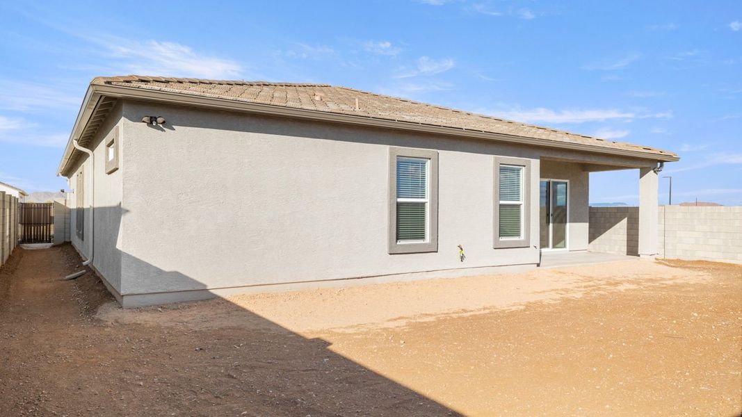 Exterior details and patio area of a home in Zanjero Pass, Waddell (Image 2). Exterior details and patio area of a home in Zanjero Pass, Waddell (Image 2).