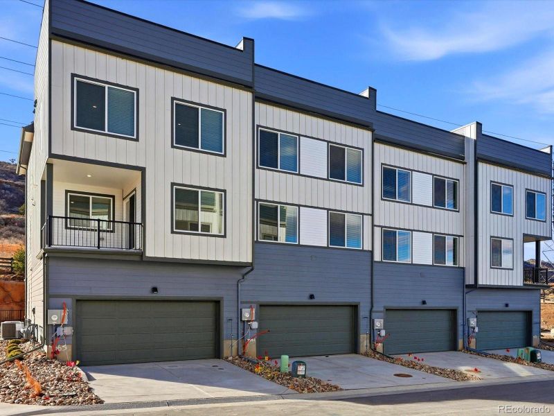 Front exterior of a new home in Three Hills, Morrison, CO, highlighting curb appeal (Image 2). Front exterior of a new home in Three Hills, Morrison, CO, highlighting curb appeal (Image 2).