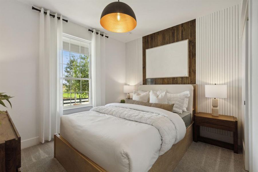 *Model Representation - Spacious secondary bedroom with large windows