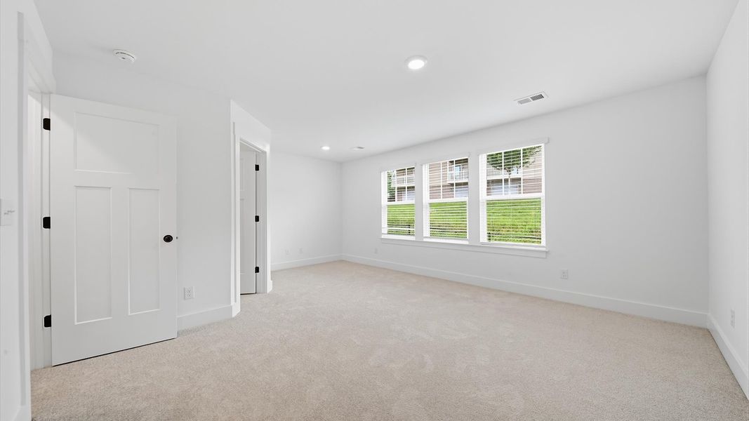 Furnished interior view inside a new home in Clayton Crossing, Arden (Image 23).