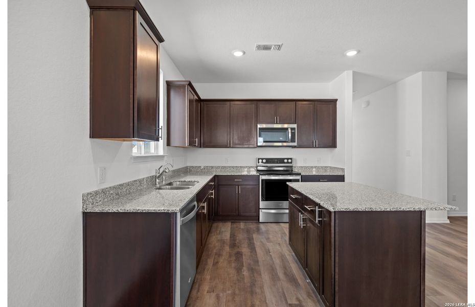 Furnished interior view inside a new home in Meadows at Clear Springs, New Braunfels (Image 3).