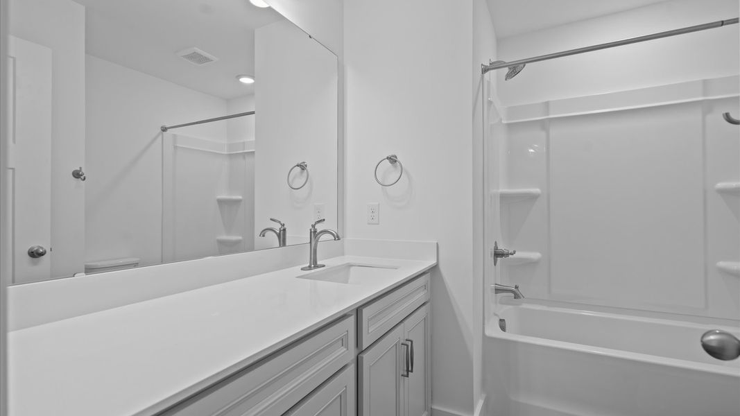 Well-appointed full bath with high standards of craftsmanship and everyday function Well-appointed full bath with high standards of craftsmanship and everyday function