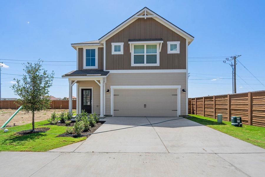 Front exterior of a new home in Cypress Trails at Bauer Landing, Hockley, TX, highlighting curb appeal (Image 1). Front exterior of a new home in Cypress Trails at Bauer Landing, Hockley, TX, highlighting curb appeal (Image 1).