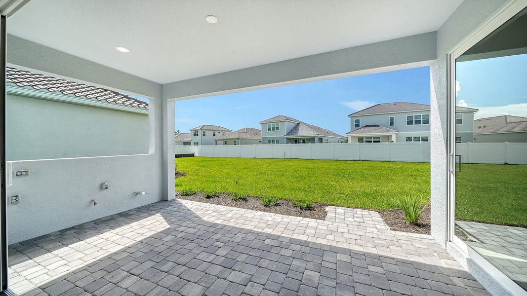 Exterior details and patio area of a home in Windward Real Estate and Homes for Sale in Sarasota, FL - Neal Communities, Lakewood Ranch (Image 22).