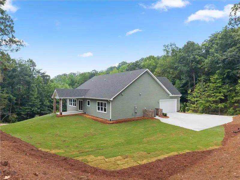 Exterior details and patio area of a home in , Baldwin (Image 32).