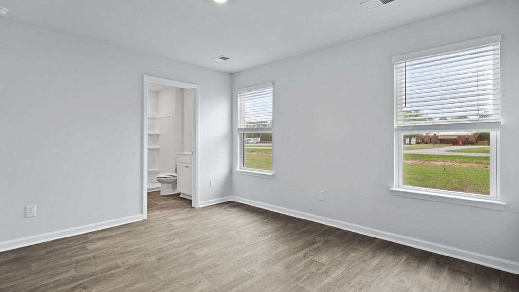 Representative unfurnished interior of a home built from the DOWNING by D.R. Horton in Saltgrass Landing, Winnabow (Image 18).