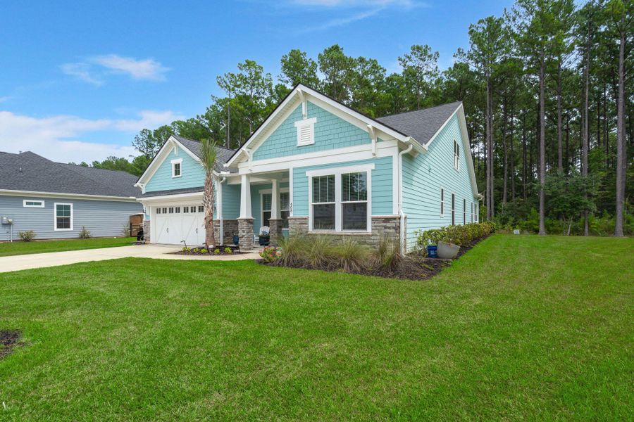 Front exterior of a new home in , Huger, SC, highlighting curb appeal (Image 20).