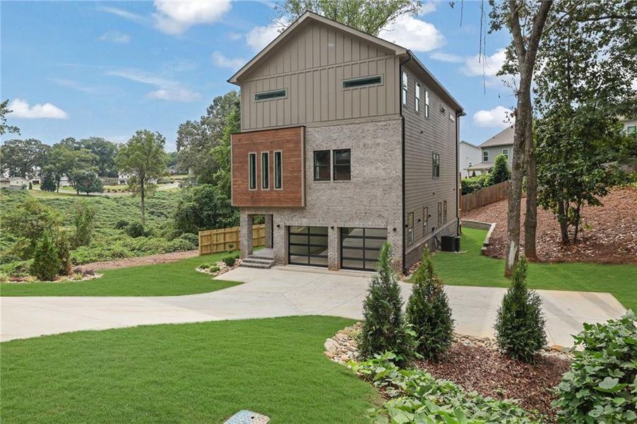 Front exterior of a new home in , Buford, GA, highlighting curb appeal (Image 1). Front exterior of a new home in , Buford, GA, highlighting curb appeal (Image 1).
