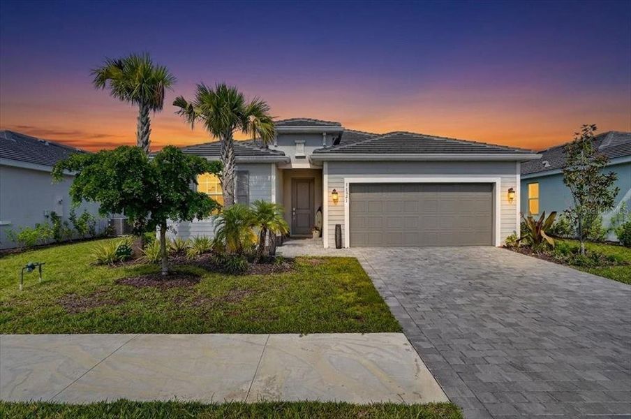 Front exterior of a new home in , Venice, FL, highlighting curb appeal (Image 24). Front exterior of a new home in , Venice, FL, highlighting curb appeal (Image 24).
