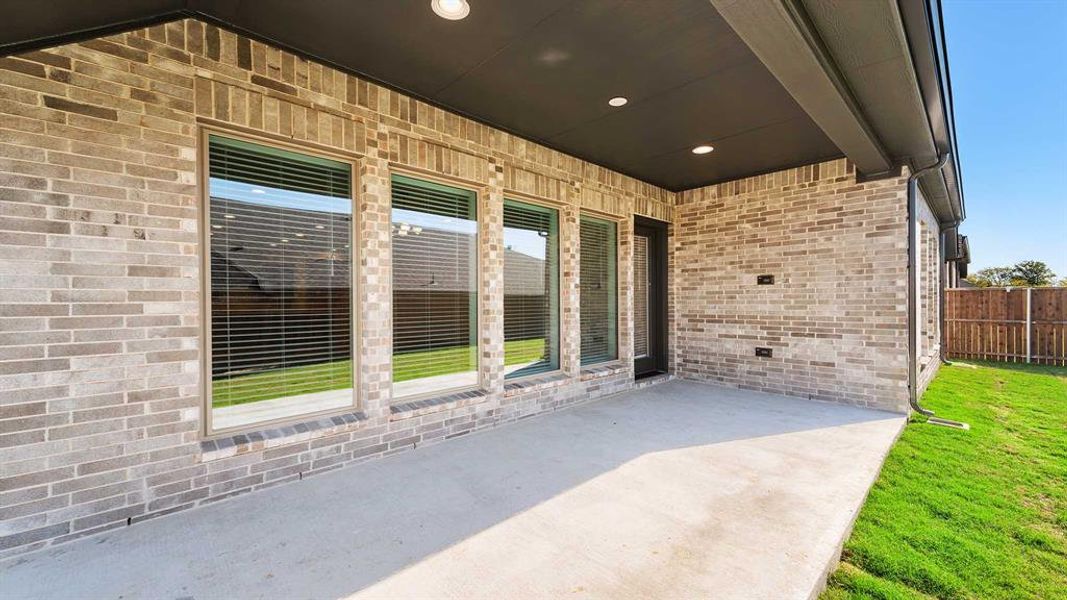 Exterior details and patio area of a home in Devonshire - Reserve 50', Forney (Image 3). Exterior details and patio area of a home in Devonshire - Reserve 50', Forney (Image 3).