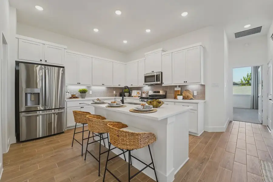 Furnished interior view inside a new home in Bridgeland Chateau, Cypress (Image 3).