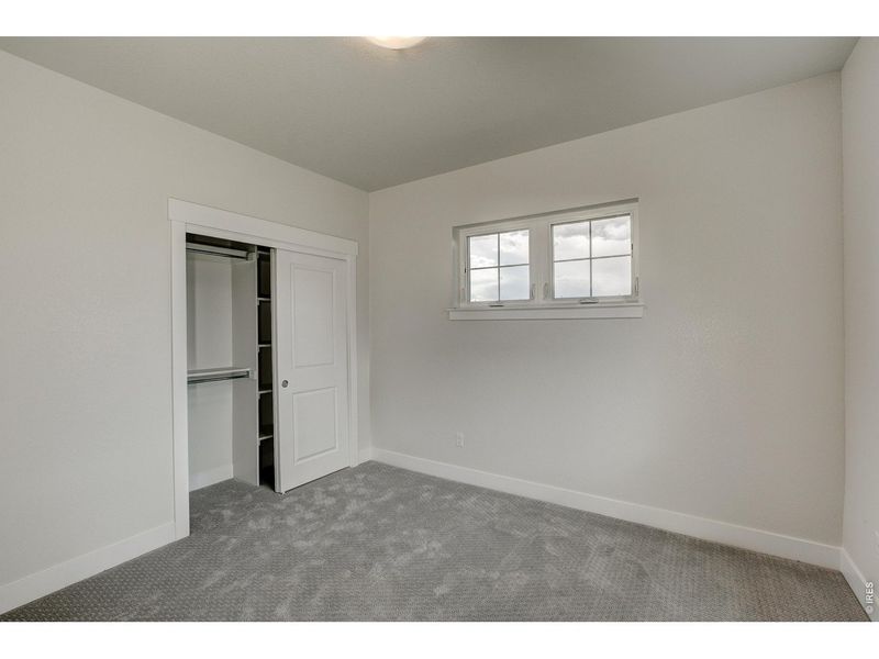 Spacious, unfurnished interior of a new home in The Lakes at Centerra - The Shores, Loveland (Image 29).