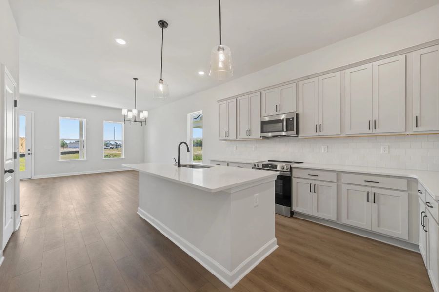 Furnished interior view inside a new home in Blue Heron Retreat, Little River (Image 5).