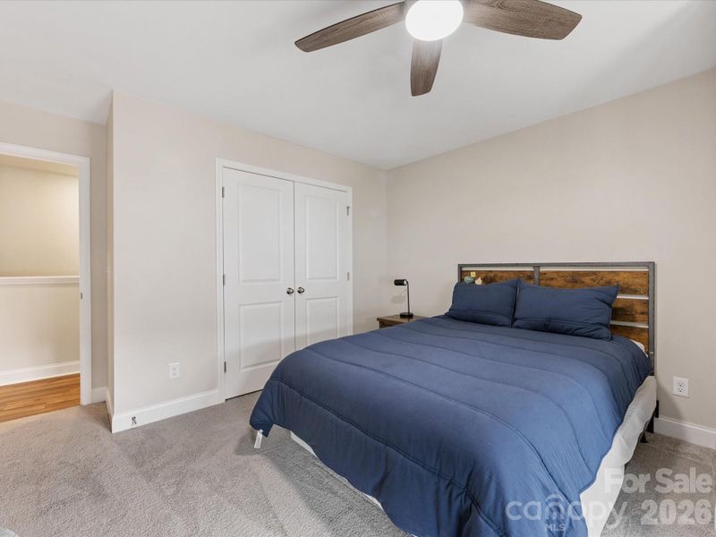 Furnished interior view inside a new home in Towns at Rea Colony, Charlotte (Image 26).