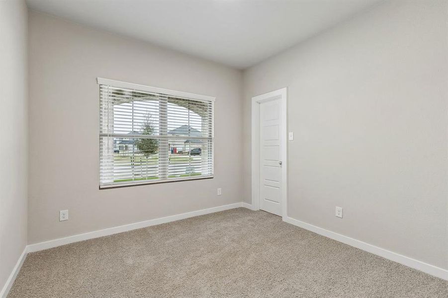 Bedroom in the Emmy II home plan by Trophy Signature Homes - REPRESENTATIVE PHOTO