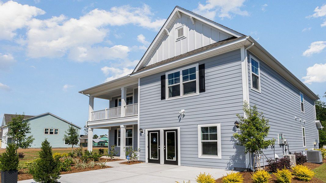 Representative exterior photo of a completed home built from the TILLMAN by D.R. Horton in Haven View, Murrells Inlet, SC (Image 23).