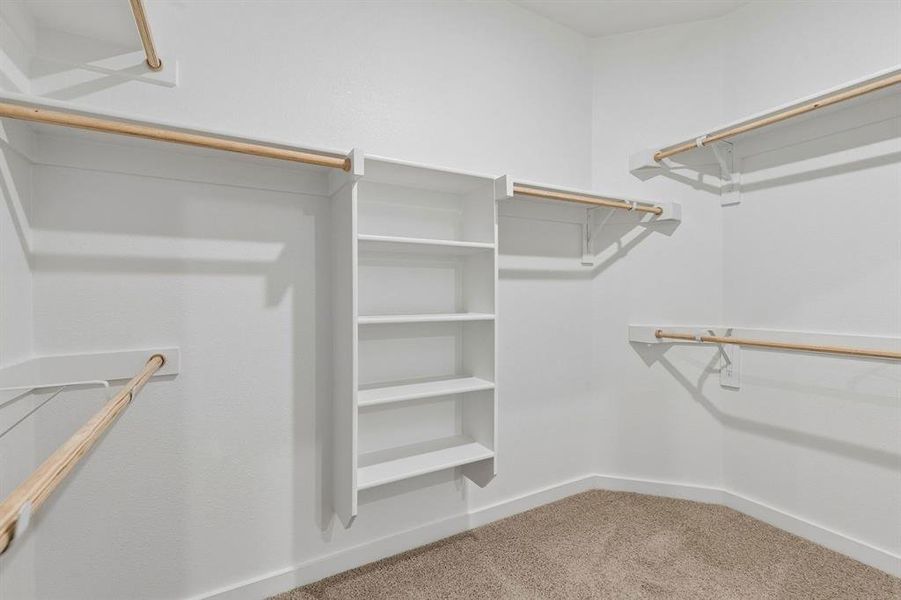 Primary Closet in the Emmy II home plan by Trophy Signature Homes - REPRESENTATIVE PHOTO