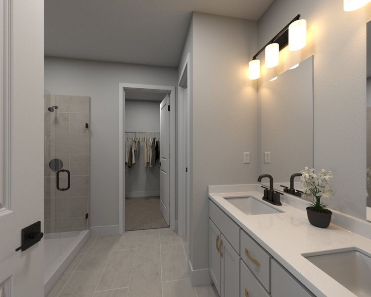 The primary bathroom offers dual vanity sinks and a walk-in shower.