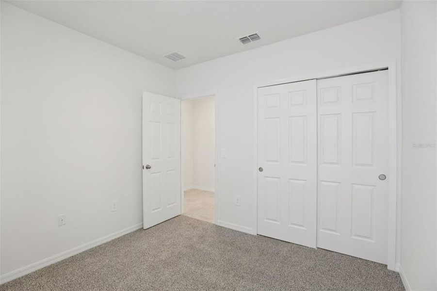 Spacious, unfurnished interior of a new home in Springs at Lake Alfred - Classic Series, Lake Alfred (Image 33).