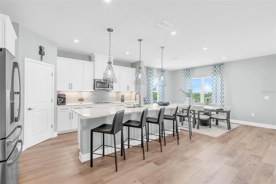 Furnished interior view inside a new home in Bella Terra, Clermont (Image 38).