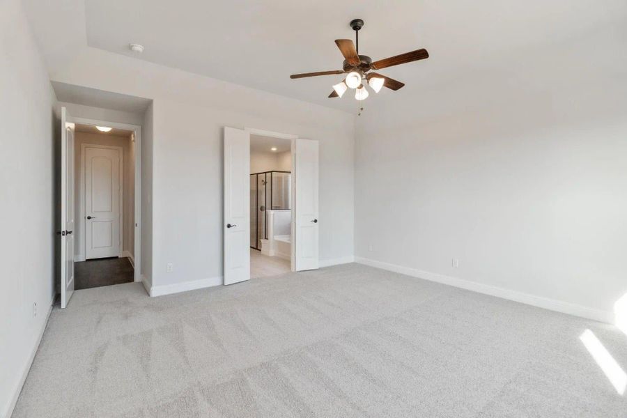 Primary Bedroom | Concept 2373 at Coyote Crossing in Godley, TX by Landsea Homes Primary Bedroom | Concept 2373 at Coyote Crossing in Godley, TX by Landsea Homes