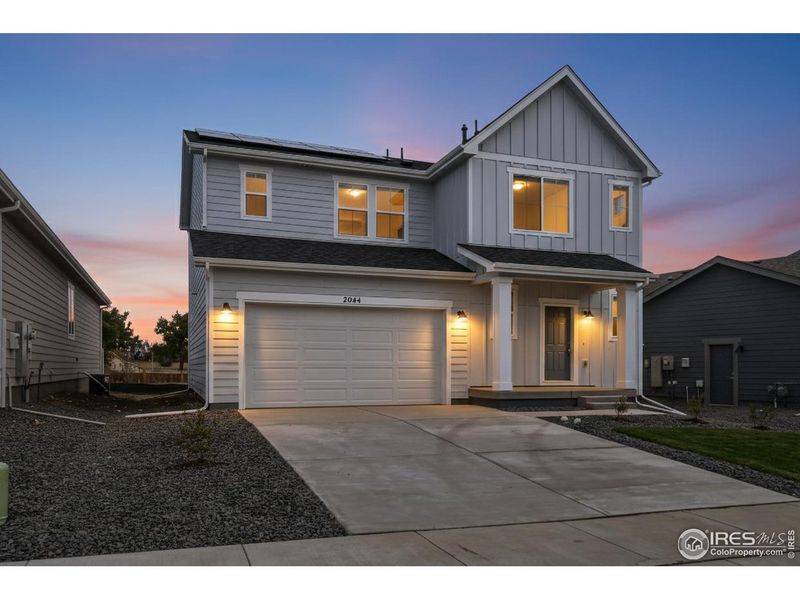 Front exterior of a new home in Hidden Creek, Frederick, CO, highlighting curb appeal (Image 26). Front exterior of a new home in Hidden Creek, Frederick, CO, highlighting curb appeal (Image 26).