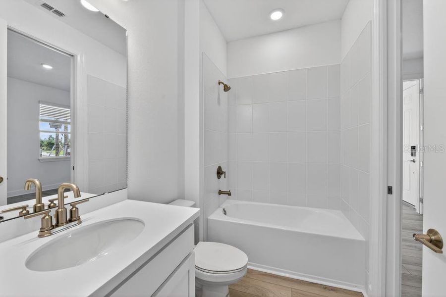 Furnished interior view inside a new home in Coasterra Community Group Page, Palmetto (Image 15).