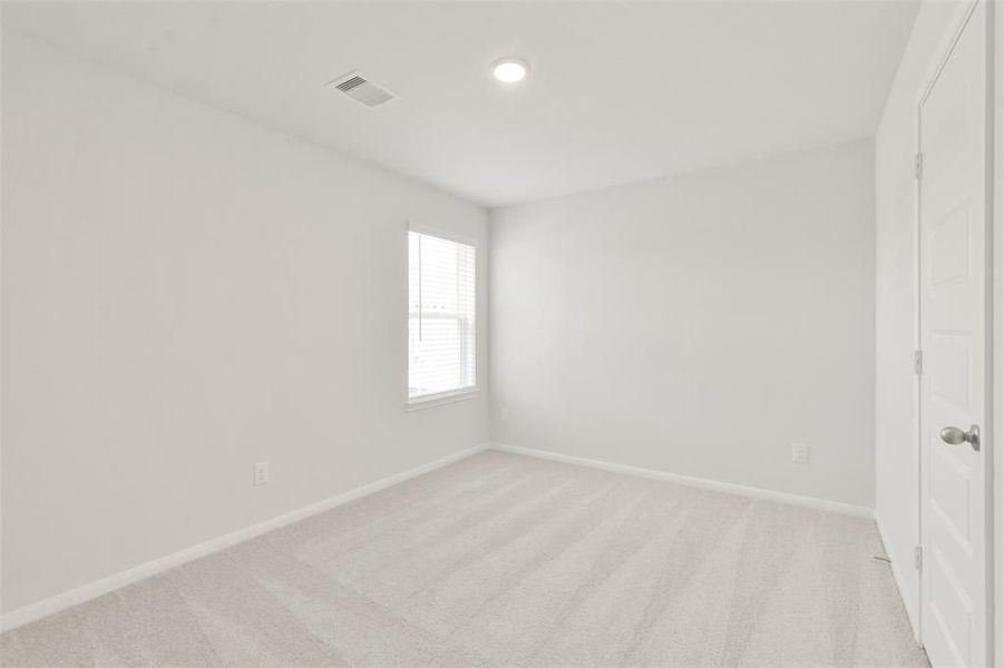 Spacious, unfurnished interior of a new home in Lakes at Black Oak, Magnolia (Image 31).